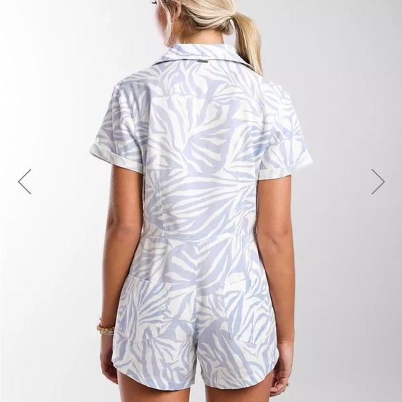 Brand new, never worn. Tags on. Palm print, snap front romper, cuffed sleeves. - Picture 3 of 9